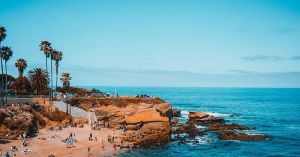 a rocky beach next to the ocean