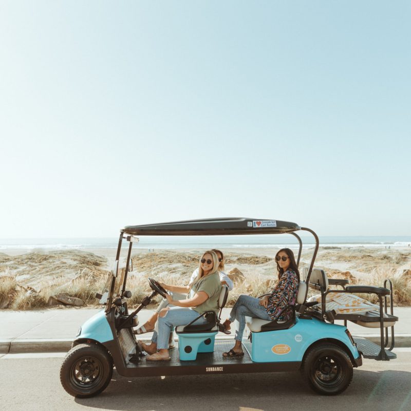 a person riding on the back of a truck