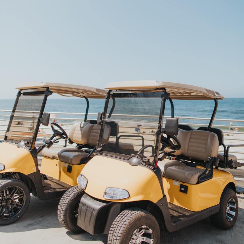 a truck is parked on the beach