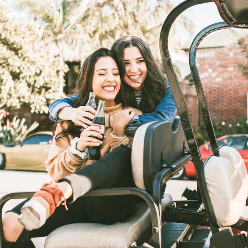 a woman sitting on a motorcycle