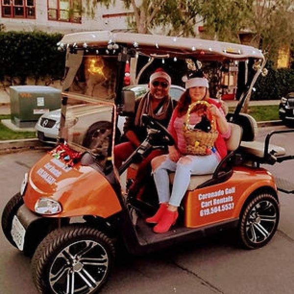 a group of people riding on the back of a truck