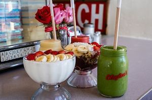 a group of glass bottles on a table