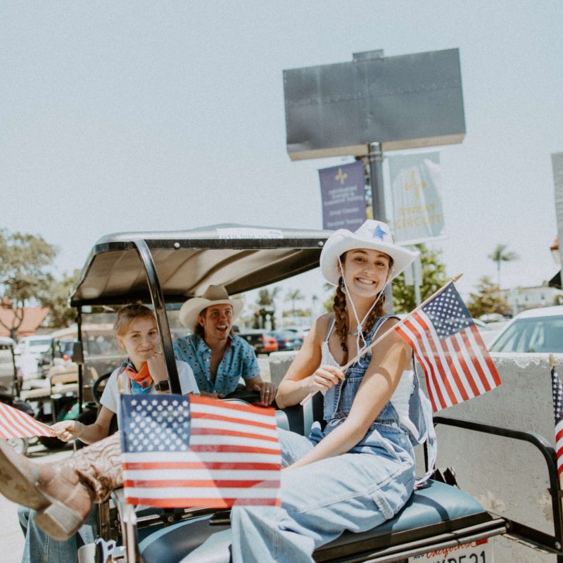 a man sitting on a cart