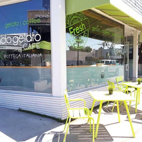 a chair sitting in front of a building