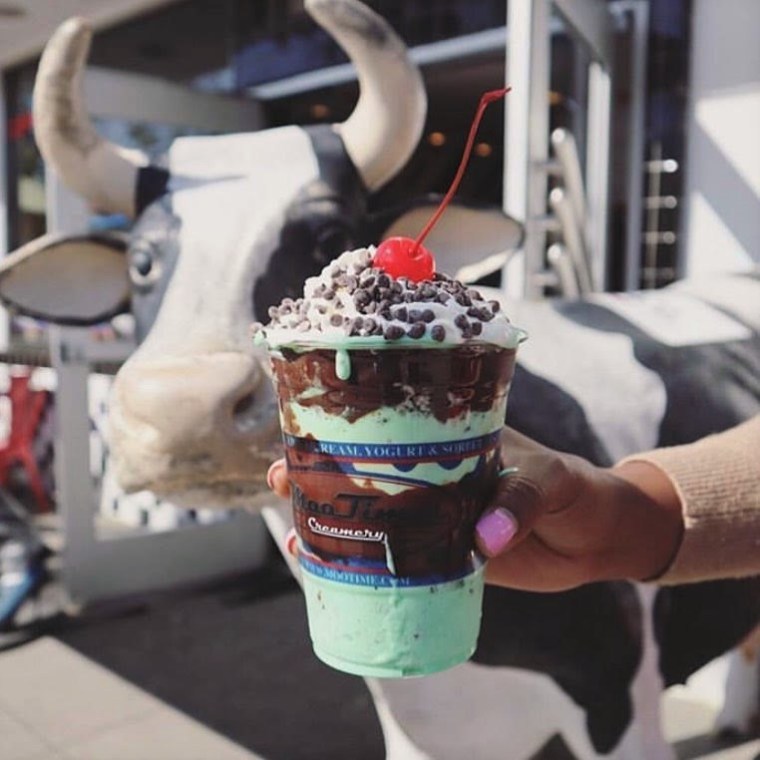 a person holding a cup