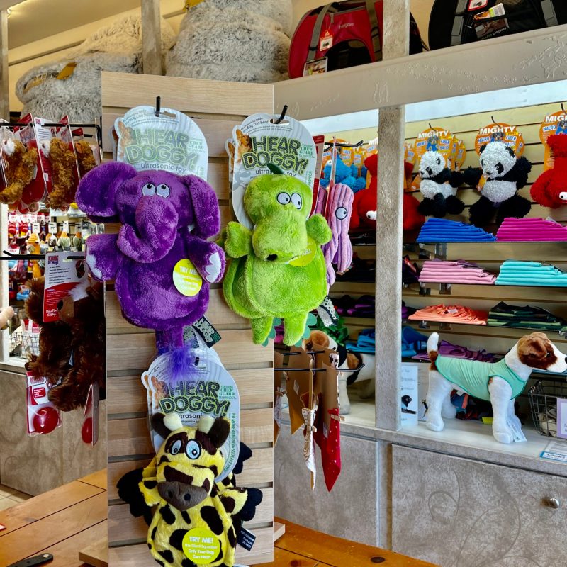 a bunch of stuffed animals sitting on top of a table