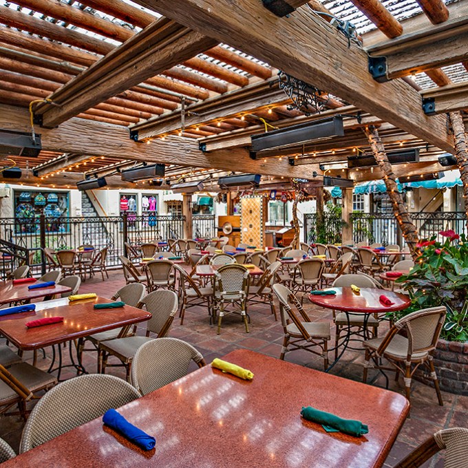 a dining room table in front of a building